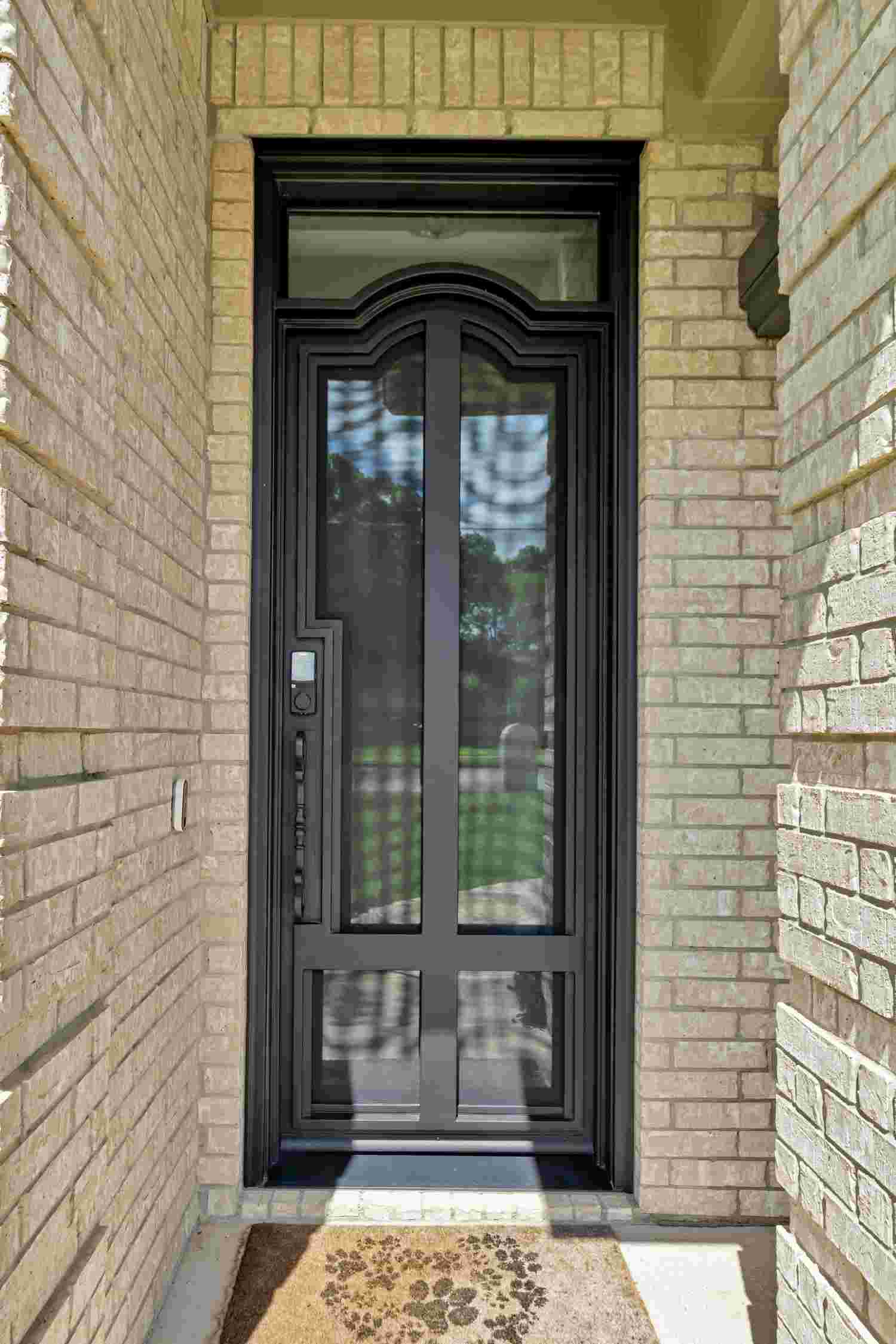 Steel single door with arched top, black finish, clear glass, transitional style