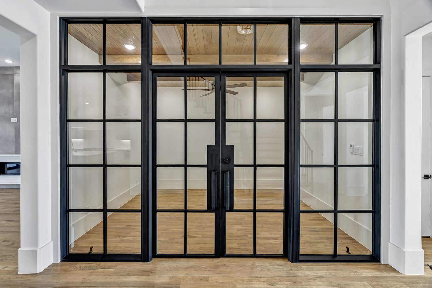 Custom steel double entry door with black grid glass from Love That Door
