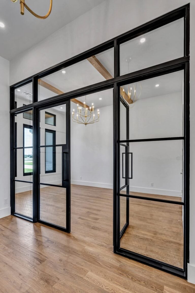 Modern custom steel single entry door in black and clear glass from Love That Door