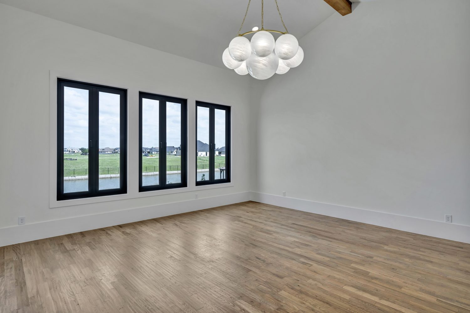 Minimalist interior room with black framed windows