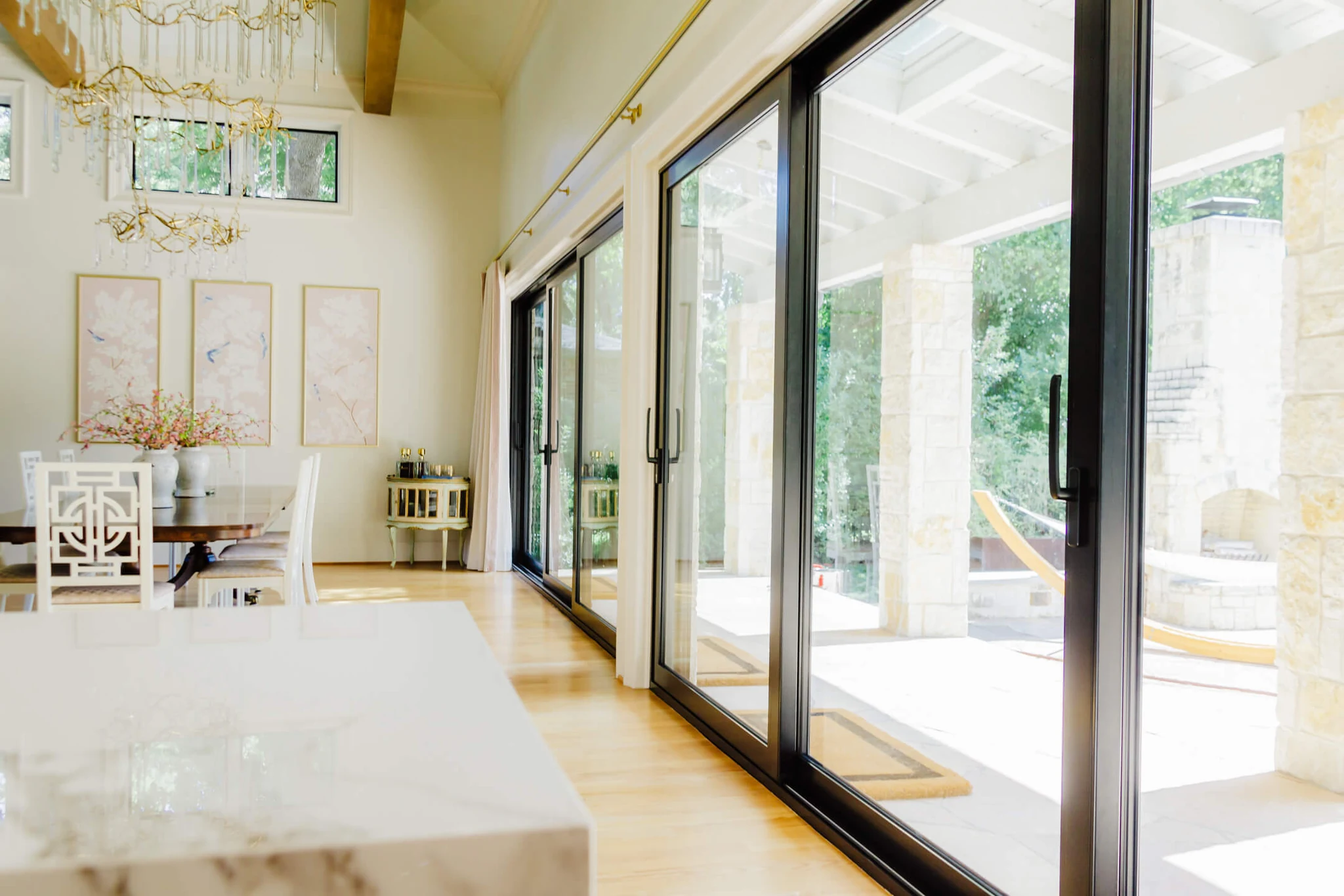 Aluminum three panel lift and slide door with outer panels open