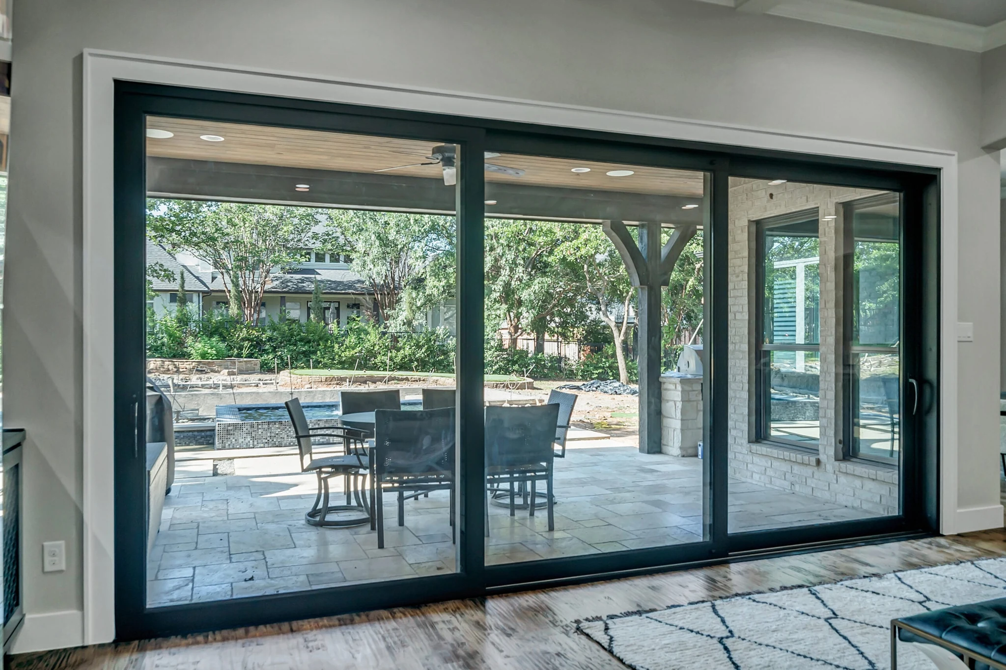 Aluminum four panel lift and slide door with two panels open