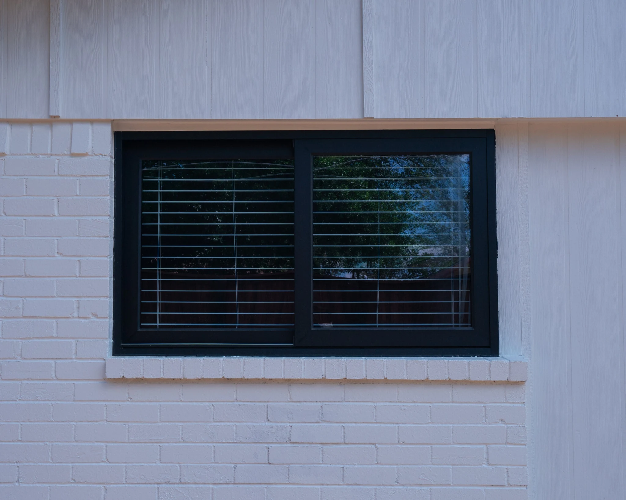 Black aluminum window with blinds