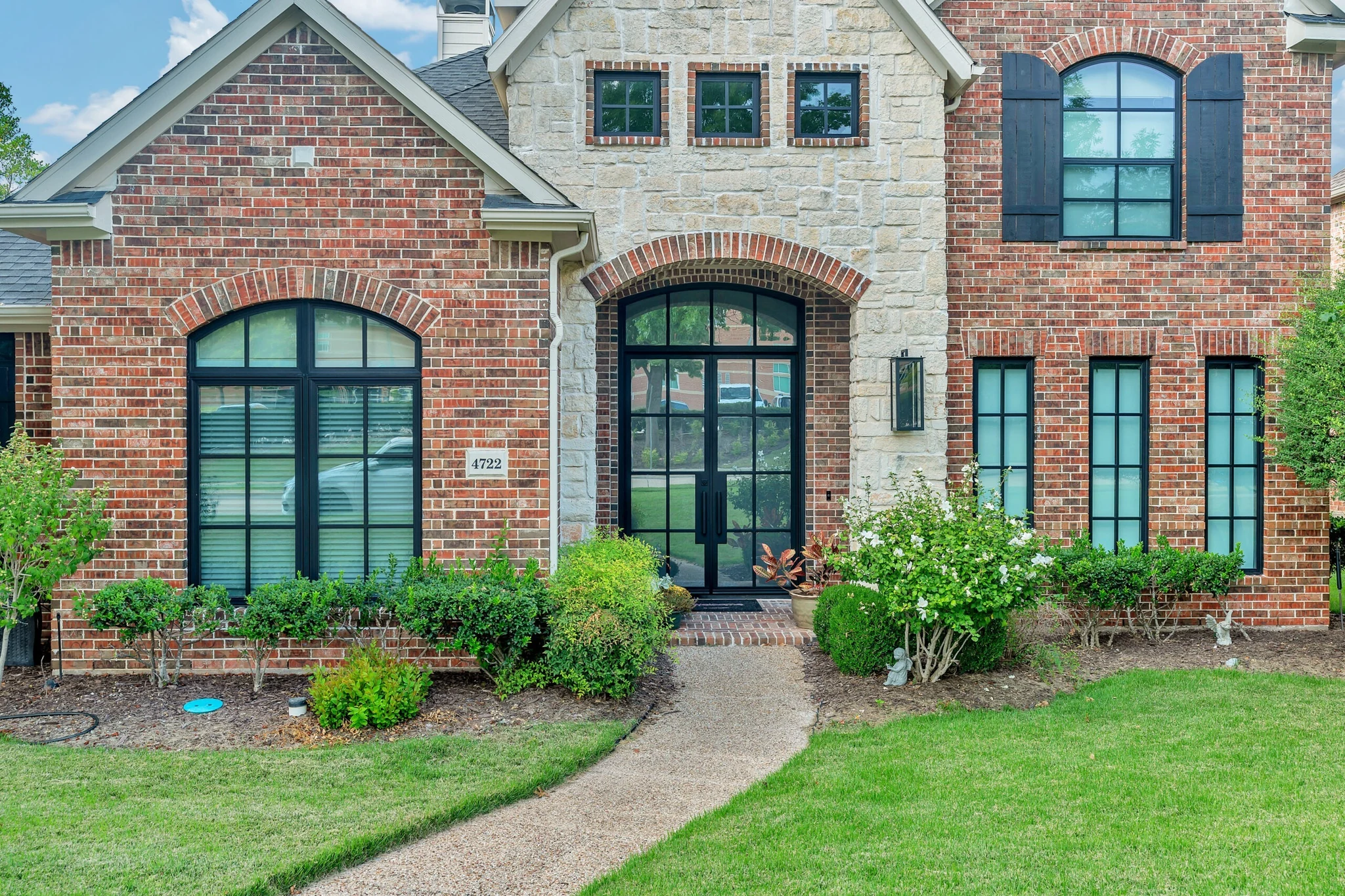 Black aluminum arched windows and doors