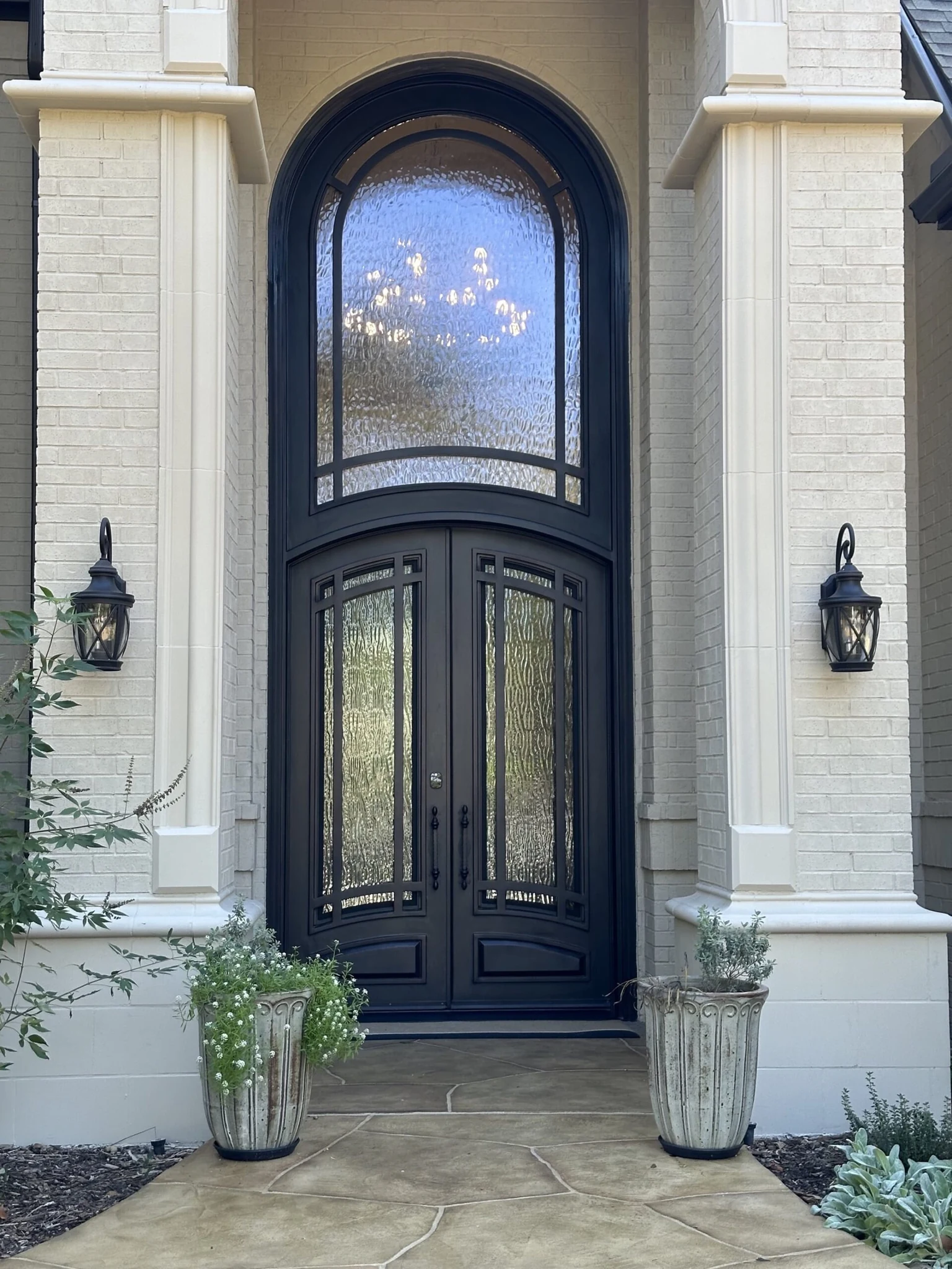 Double wide entry door with tall transom, black steel