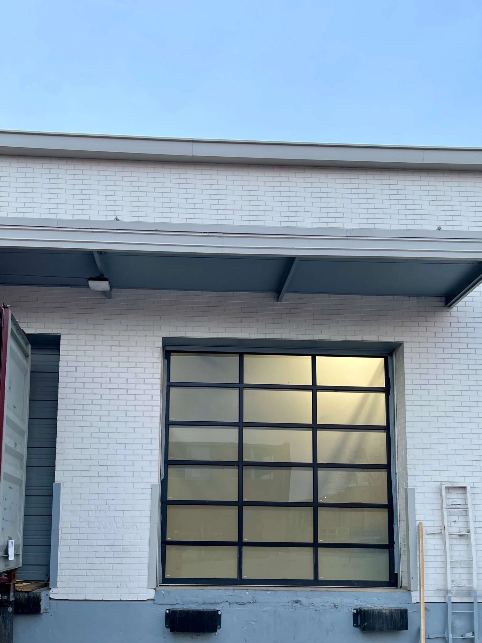 Modern garage door with frosted glass rectangular panes
