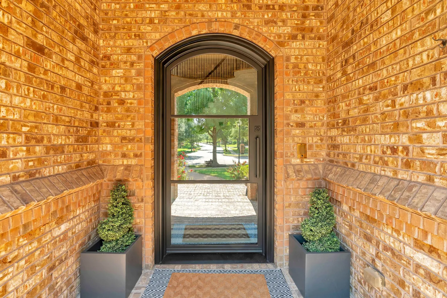Wide single iron entry door installation view - Love That Door